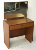 A G Plan dressing table, an adjustable mirror to the top, a single drawer below,
