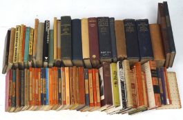 Two boxes of 20th century books, including Penguin examples and volumes regarding military subjects,