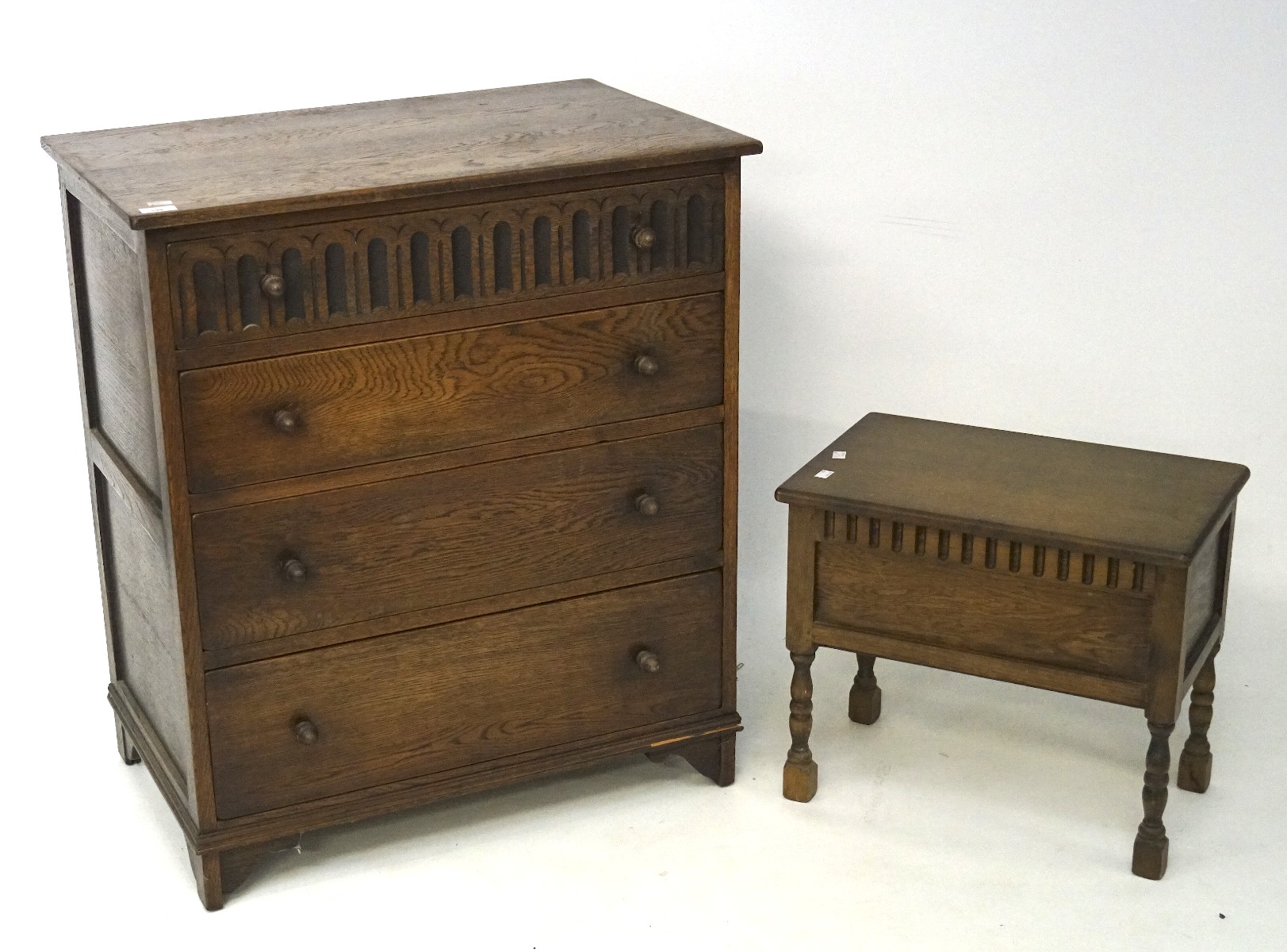 A mid century oak chest of drawers and a small blanket box, the chest with four long drawers,