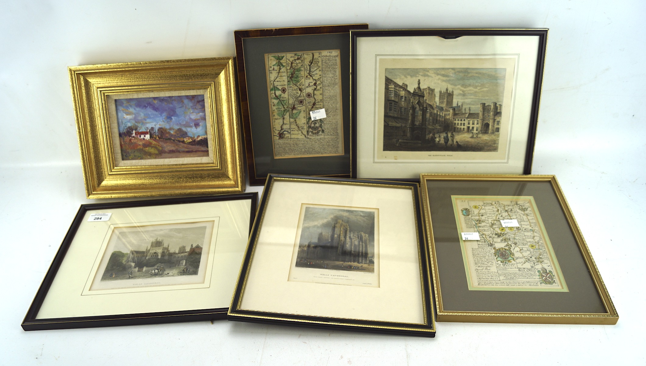 A selection of maps, prints and a oil on board, the paining depicting a rural landscape,