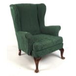 A Victorian rocking chair and winged back armchair,