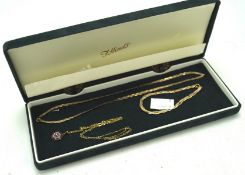 A 9ct gold two tone necklace and bracelet, together with 9ct gold stone set pendant and a chain,