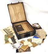 A silk lined vintage traveling case, with the original travelling labels,