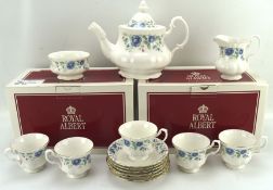 A Royal Albert part tea service, in the 'Meadowcroft' pattern, including a teapot, cups and saucers,