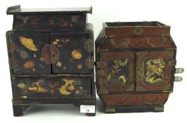 Two Chinese cabinets, the wooden structures decorated with gilt flowers and birds,