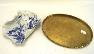 A Japanese blue and white dish and Chinese brass tray, the dish in the form of a Lotus leaf,