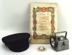 A collection of London Transport related items, to include a torch,