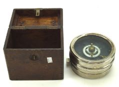 A vintage pigeon clocker, within a wooden box with handle to the top,