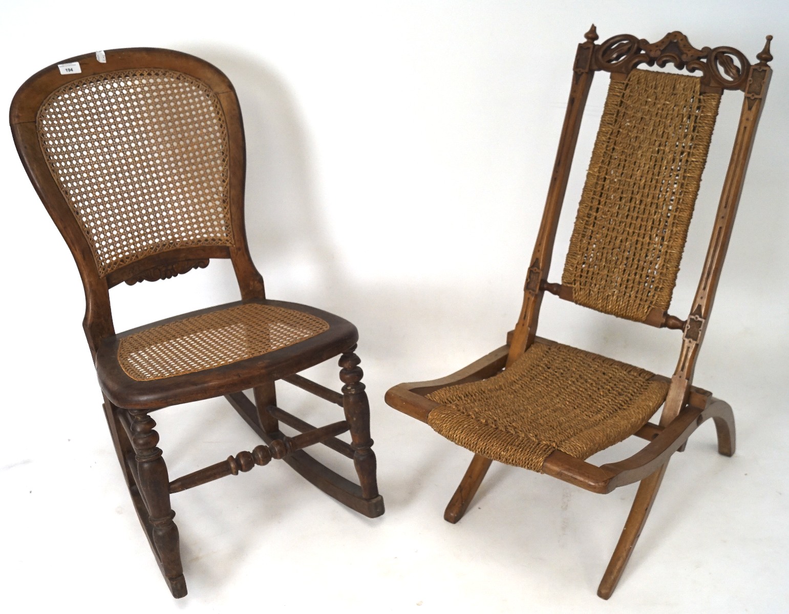 A wooden framed rocking chair and a folding chair, both with wicker details,
