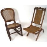 A wooden framed rocking chair and a folding chair, both with wicker details,