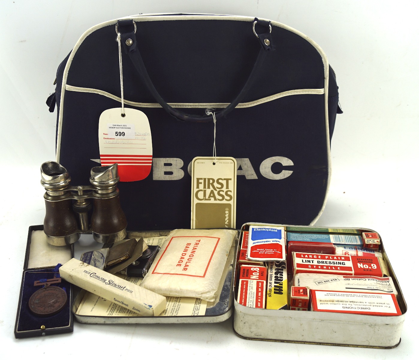 An assortment of mixed collectables including a BOAC first class flight bag,