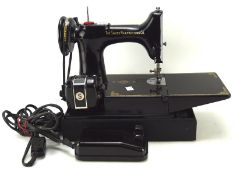 A Singer 'Featherweight' model 221k (1951) sewing machine,