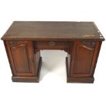 A late 19th century mahogany desk, the kneehole under a single drawer,