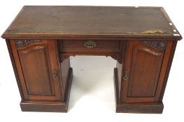 A late 19th century mahogany desk, the kneehole under a single drawer,