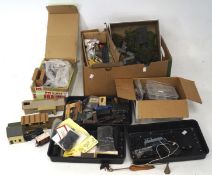 A collection of model railway related wares, including coaches, foliage, buildings,