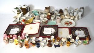 An extensive collection of ceramics, including egg cups, Spode display plates,