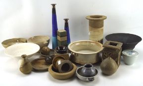 A collection of stoneware, including vases, dishes, urns and more,