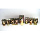A Royal Doulton ceramic set of Snow White and the seven drawfs, each with original box,
