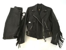 A vintage leather biker jacket and trousers, the jacket with dragon emblem to inside liner,