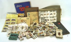 A large quantity of loose cigarette cards, mostly 20th century, featuring animals,