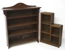 Two 20th century bookshelves, one being mahogany, the other being oak, the larger with four tiers,