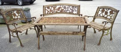 A set of garden furniture, comprising a bench, table and two chairs,