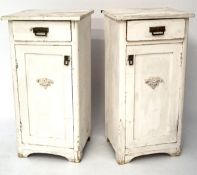 A pair of white painted pine bedside cabinets,