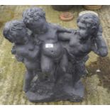 A resin figure group featuring cherubs,