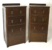 A pair of early 20th century stained wooden chests of drawers, each having four drawers,