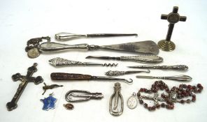 A selection of silver and white metal wares, to include a shoe horn, sewing hook,