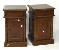 A pair of stained wooden bedside cabinets, both with a single door with a drawer above 65.