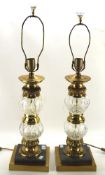 A pair of ornate contemporary table lamps, the brass frame interspersed with glass details,