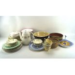 A collection of vintage pottery and porcelain, including Royal Doulton cups and saucers,