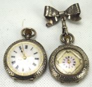 Two continental white metal ladies fob watches, one being marked 935 silver,