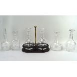 Two Stuart cut glass decanters on stand,