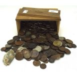 A box of assorted coinage, mostly English,