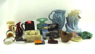 A collection of ceramics and glassware, including a commemorative beaker, glass jug,