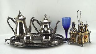 A four piece silver plated tea set on a galleried serving tray, 52cm wide,