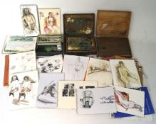 Two artist boxes and a selection of sketch books,