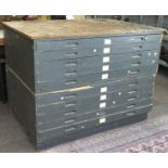 An early 20th century grey painted plan chest, in two sections,