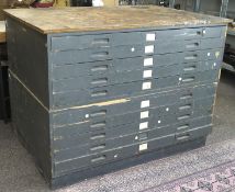 An early 20th century grey painted plan chest, in two sections,