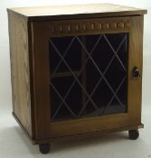 A contemporary glazed cabinet,