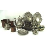 An assortment of metalware, to include three brass vessels tea set,