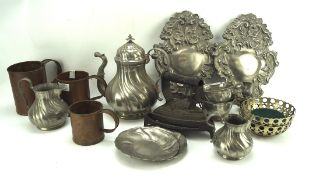 An assortment of metalware, to include three brass vessels tea set,