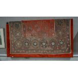 A large Mongolian wall hanging of star and foliate motifs in chain stitch on brown cotton,