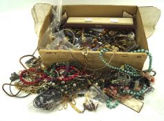 A collection of assorted costume jewellery, to include chains,