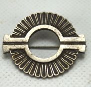 A 20th century silver Georg Jensen brooch, in the form of a stylised wreath, marked 925,