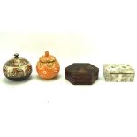 A collection of four continental boxes, one with mother of pearl inlay, another being papier mache,