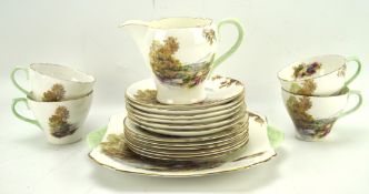 A Shelley 'Heather' pattern part tea set, comprising tea cups.
