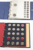 Two folders containing a collection of circulated coins from GB, to include crowns,